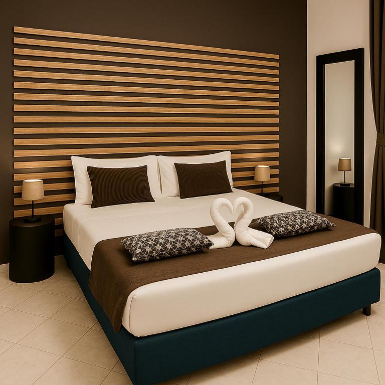 Camera Ciak 3 — letto matrimoniale